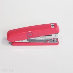 Red book sewer book stapler book office space stapler