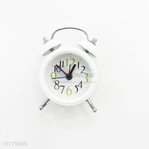 white alarm clock time clock