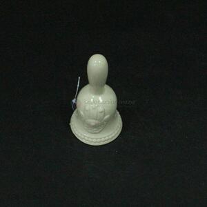 Competitive price ceramic <em>crafts</em> white ceramic ring bell <em>porcelain</em> hand bell