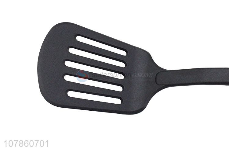 Hot selling black hollow spatula household long handle spatula wholesale