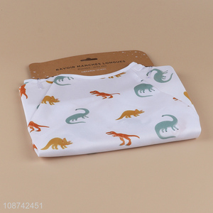 Hot selling cartoon dinosaur printed mess proof baby bibs for eating