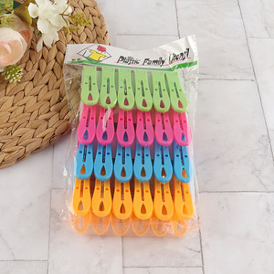 China imports 24pcs colored plastic clothes pins with spring