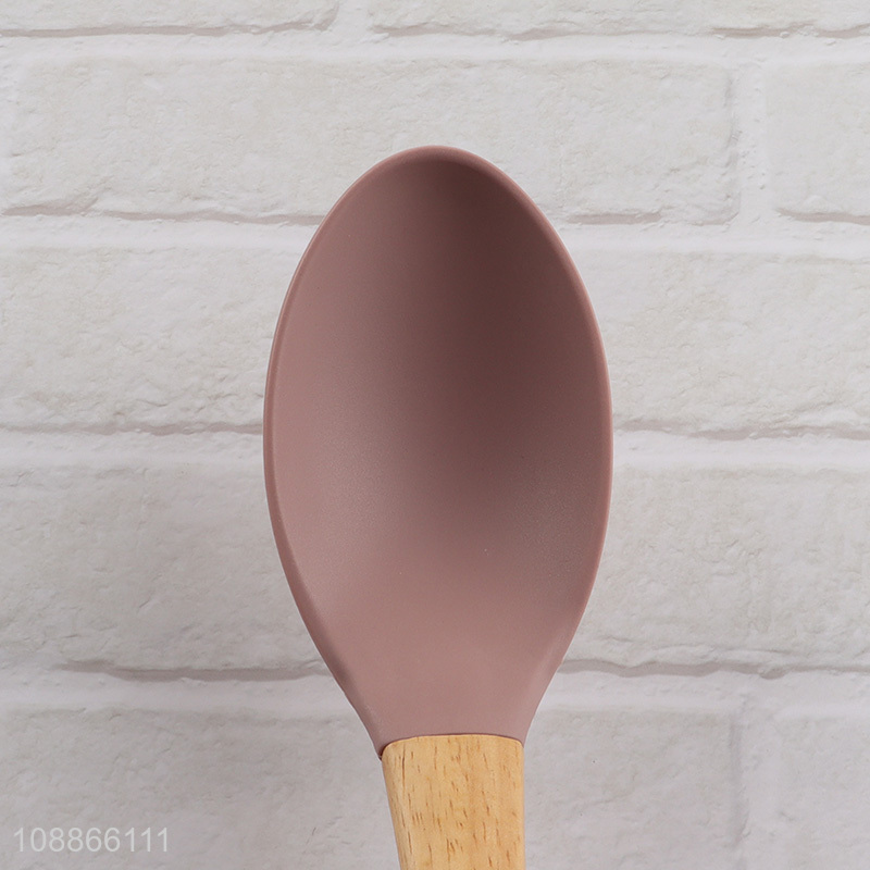 China imports silicone nylon kitchen cooking spoon with wooden handle