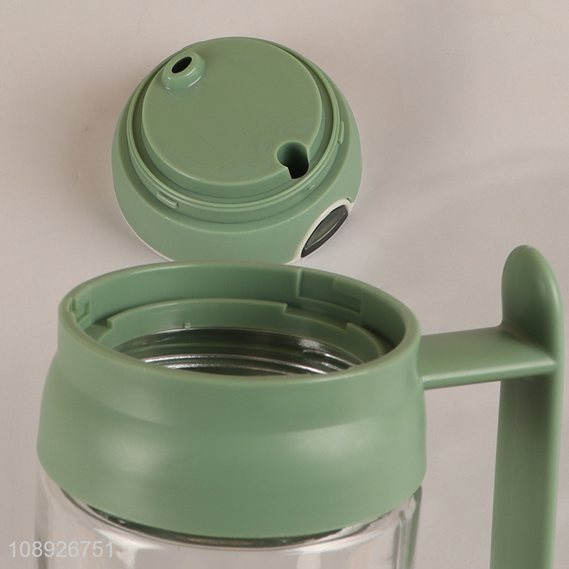 Wholesale 530ml glass olive oil dispenser bottle with automatic cap