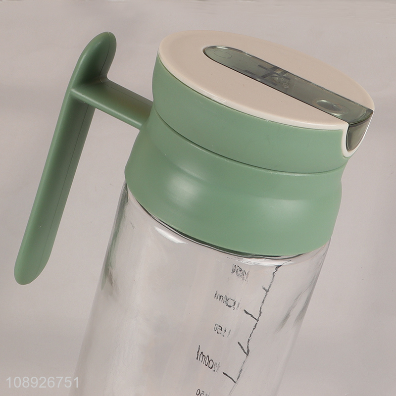 Wholesale 530ml glass olive oil dispenser bottle with automatic cap