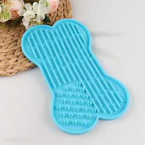 Good price bone shape silicone pet licking pad slow feeder