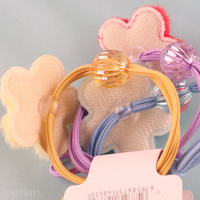 Online wholesale flower shape colorful elastic hair ring hair rope