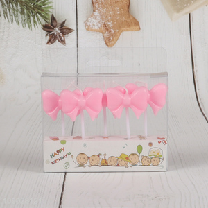 Yiwu market pink bowknot shape birthday cake decorative candle set for sale